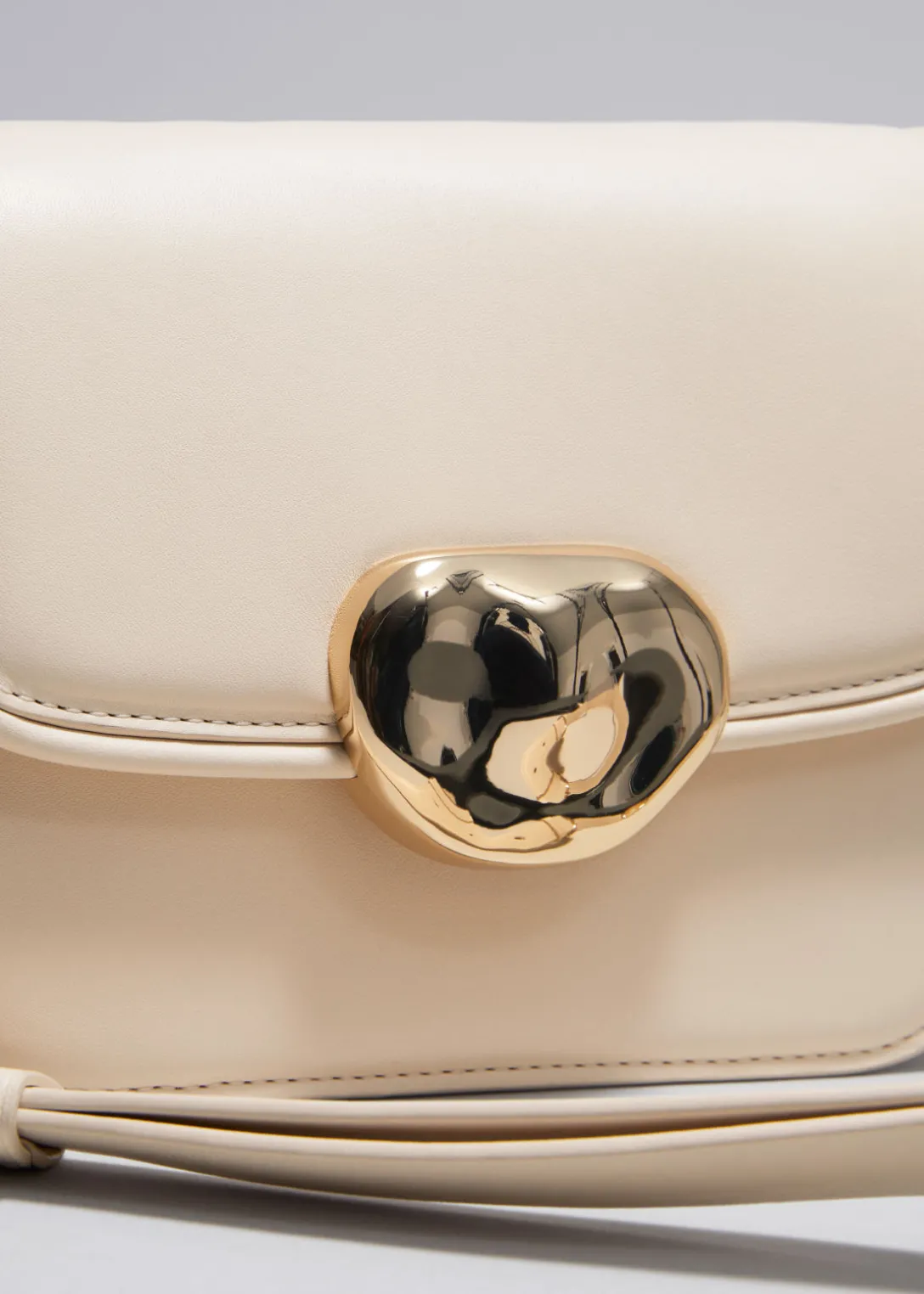 Shop & Other Stories Small Sculptural-Buckle Leather Bag Cream