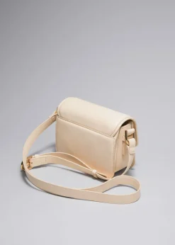 Shop & Other Stories Small Sculptural-Buckle Leather Bag Cream